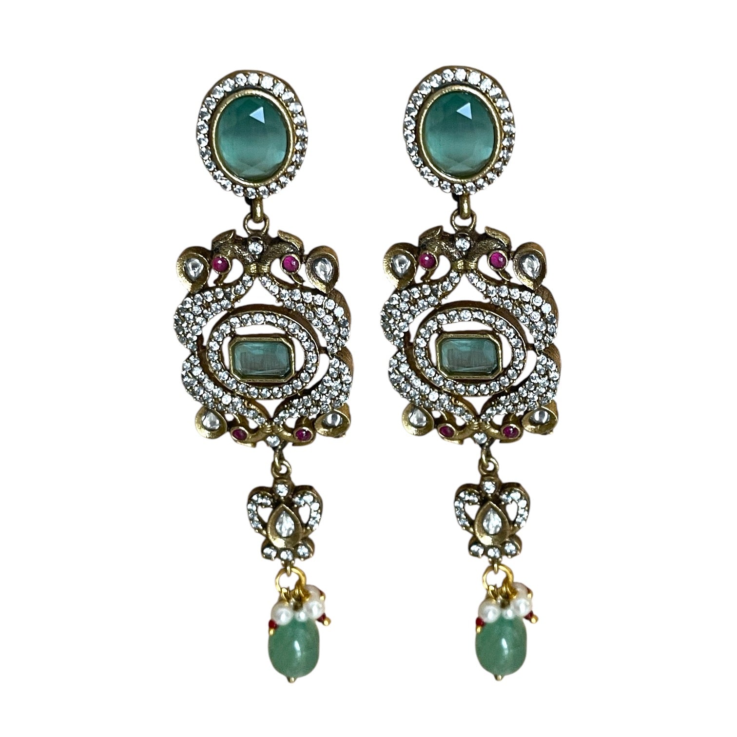 The graceful drop bead adds movement and fluidity, embodying Annetta’s daring spirit and acrobatic elegance. The green jade symbolizes vitality and renewal, while the luxurious gold adds timeless sophistication. Inspired by Annetta’s extraordinary talents and captivating allure, these earrings capture the perfect balance of romantic artistry, feminine strength, and Parisian glamour.