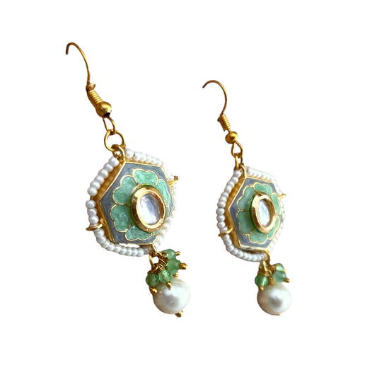 These earrings embody the free-spirited elegance and musical beauty of classic jazz. The Gypsy Earrings feature a striking hexagonal shape, with lustrous pearls dangling gracefully beneath, creating movement and light. Hand-painted green enamel adds a pop of color