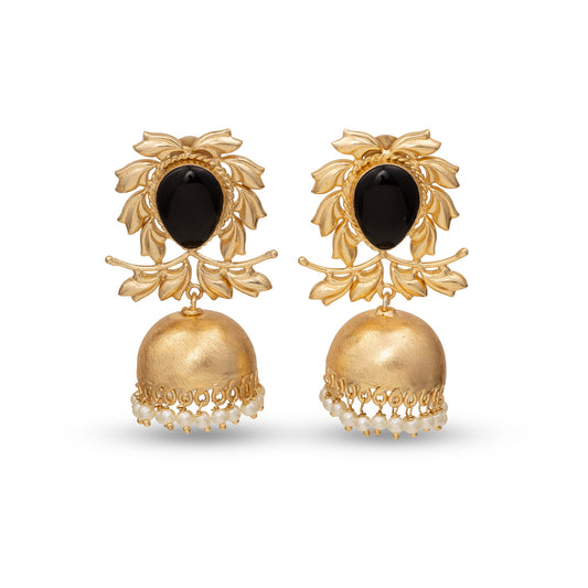 Pair of gold earrings with black stones on a white background