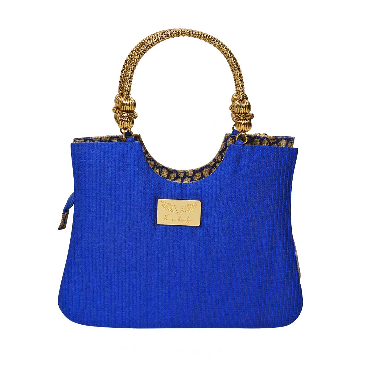 Suriya Mini tote blue and gold with ornate handles. As seen on ramp at NYFW 2021 and editorials. Back view with logo plaque
