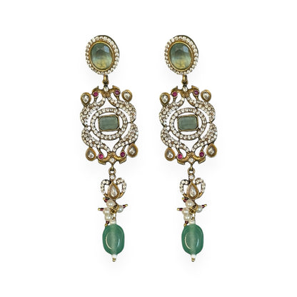 The graceful drop bead adds movement and fluidity, embodying Annetta’s daring spirit and acrobatic elegance. The green jade symbolizes vitality and renewal, while the luxurious gold adds timeless sophistication. Inspired by Annetta’s extraordinary talents and captivating allure, these earrings capture the perfect balance of romantic artistry, feminine strength, and Parisian glamour.