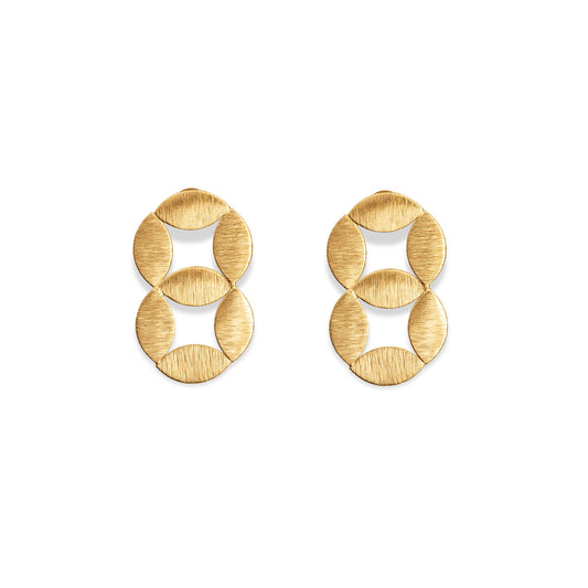 Pair of gold earrings on a white background