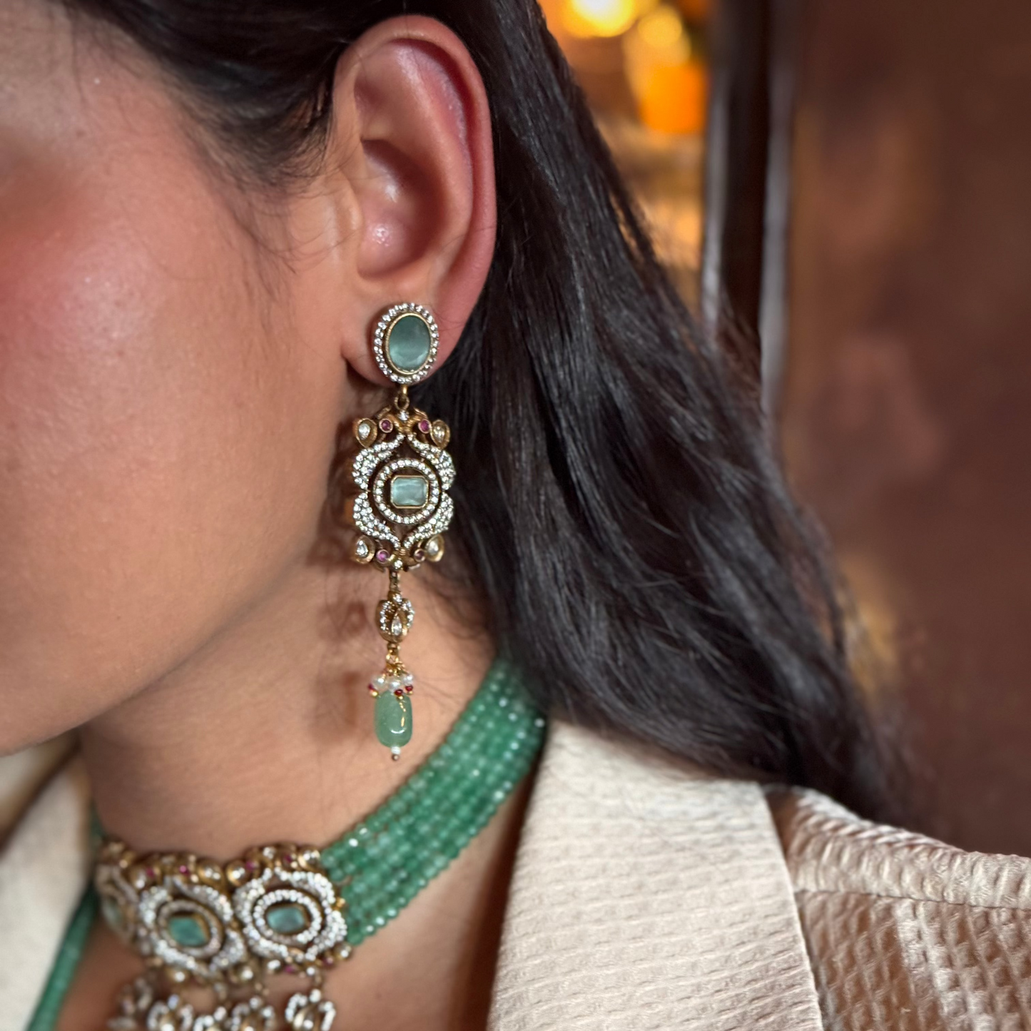 The graceful drop bead adds movement and fluidity, embodying Annetta’s daring spirit and acrobatic elegance. The green jade symbolizes vitality and renewal, while the luxurious gold adds timeless sophistication. Inspired by Annetta’s extraordinary talents and captivating allure, these earrings capture the perfect balance of romantic artistry, feminine strength, and Parisian glamour.