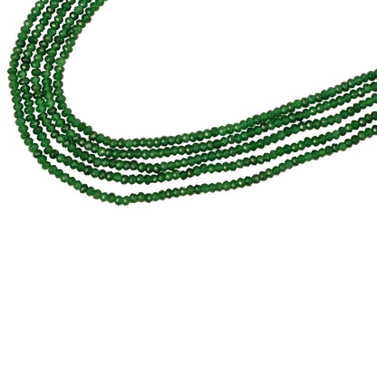 Green beads on a white background