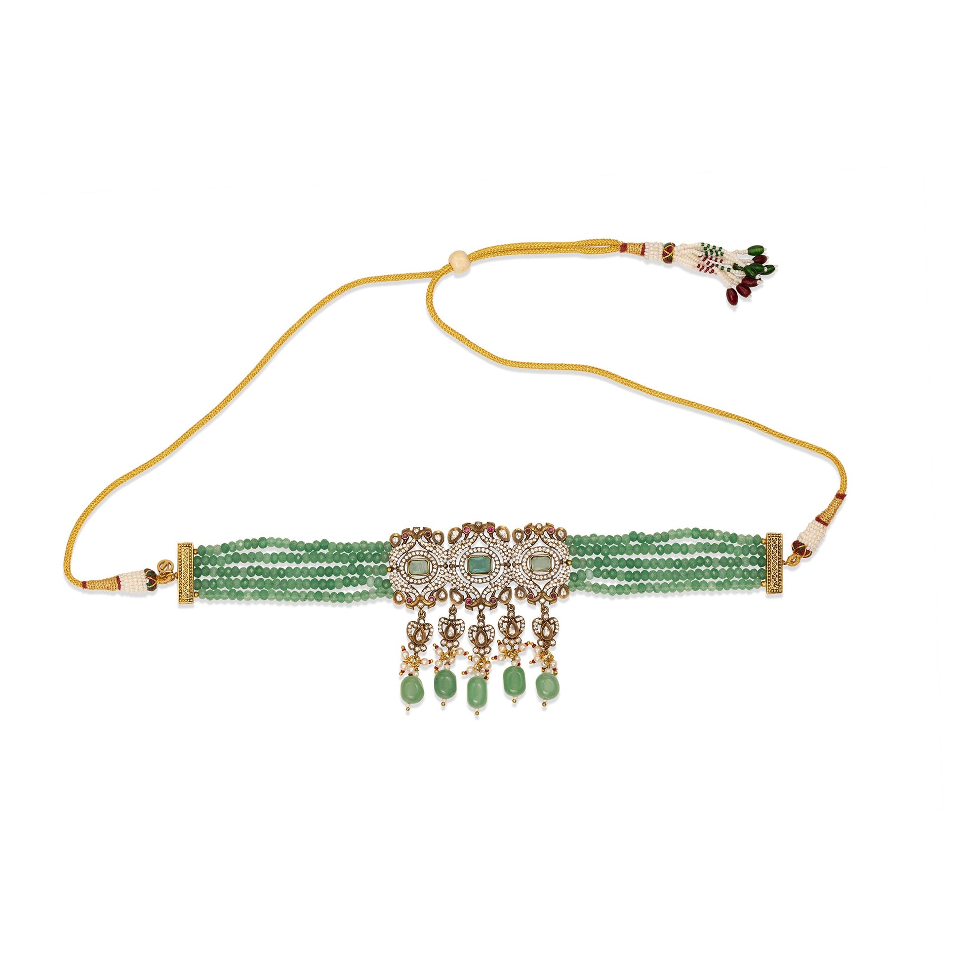Decorative choker with green beads and gold accents on a white background