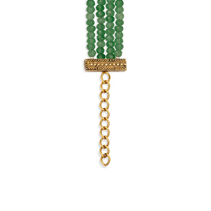 Green beaded bracelet with a gold chain on a white background