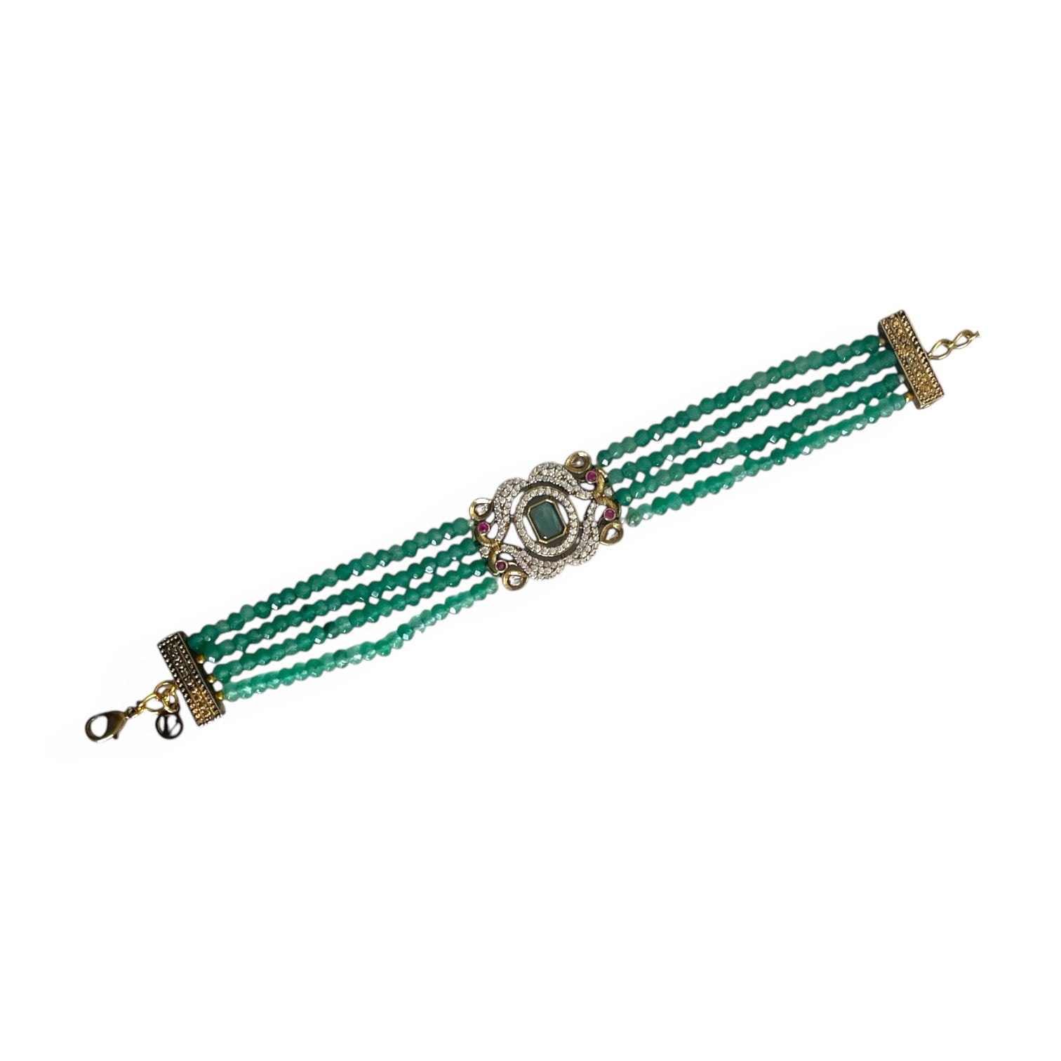 The Giovanna Bracelet is a luxurious tribute to Edith Piaf, named after her middle name, Giovanna. Handcrafted with four strands of jade beads on each side, this elegant bracelet features a rectangular center adorned with vibrant red, green, and white stones—each chosen for their symbolic meaning and energy.