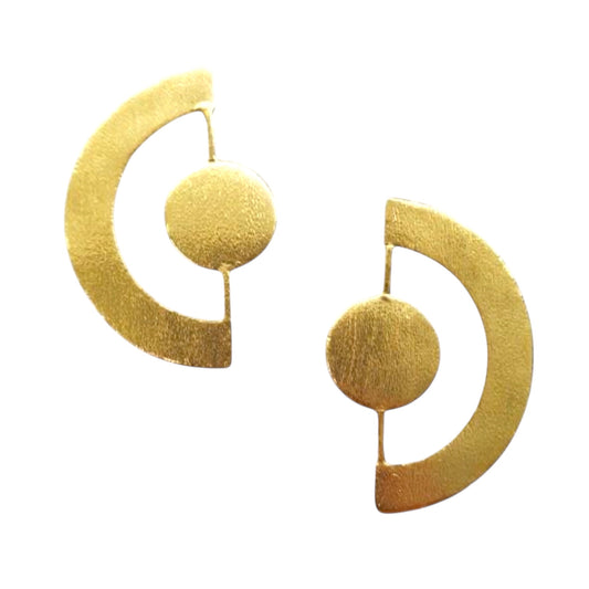 Gold circular earrings on a white background