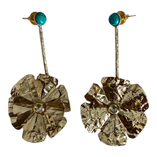 Gold floral earrings with turquoise and clear gemstones on a white background