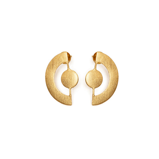 Gold stud earrings on a white background