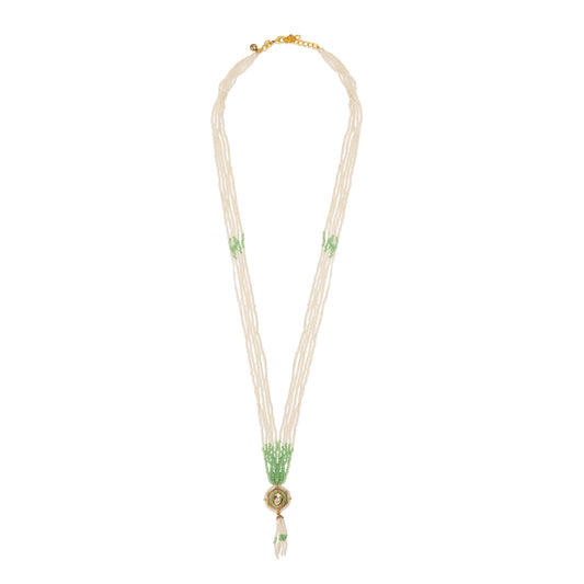 Necklace with green accents on a white background