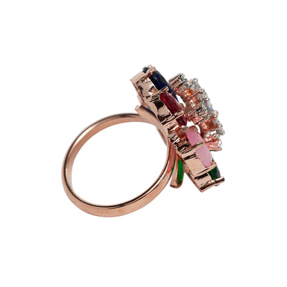 Multicolored gemstone ring with rose gold band on a white background