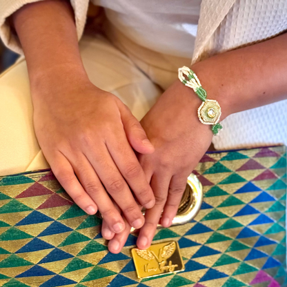Model wearing beaded bracelet 