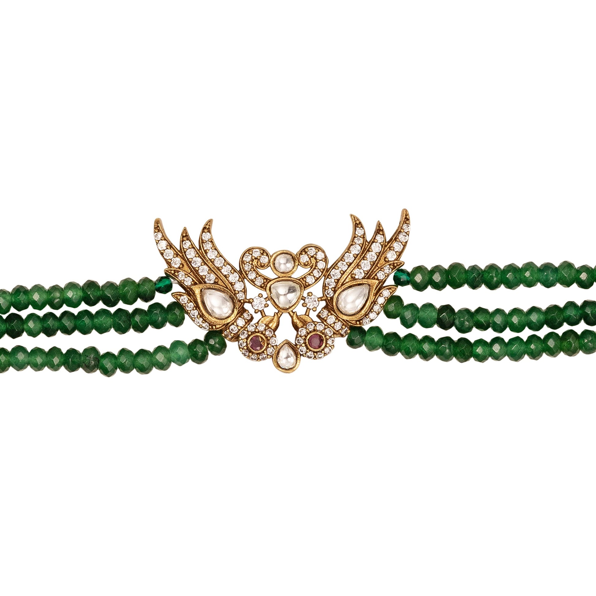 Green jade beaded bracelet with gold and gemstone clasp on a white background