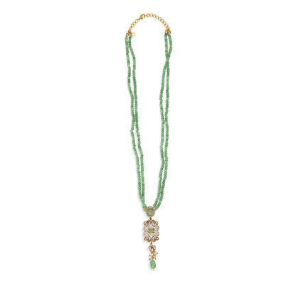 Green beaded necklace with a decorative pendant on a white background