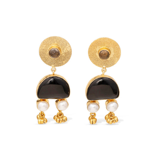 Gold earrings with black and pearl accents on a white background