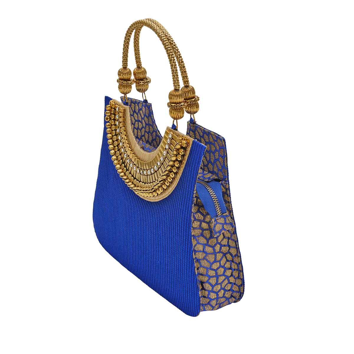 Suriya Mini tote blue and gold with ornate handles. As seen on ramp at NYFW 2021 and editorials. Side  view, animal print flap